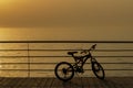 Sunset background sky landscape with bike silhouette. no people. object of a mountain bike. Sunny sunrise. Bicycle beautiful yello Royalty Free Stock Photo