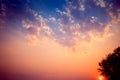 Sunset background with wonderful golden yellow sky.Dusk sky in the evening,amazing dramatic and wonderful cloud at twilight