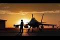 sunset backlit view of military fighter jet pilot beside parked military airforce plane next to barracks or hangar as wide banner