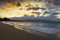 Sunset in Baldwin Beach with Sand, Ocean, Waves, Reflections and Colorful Sky in Maui, Hawaii, USA. Royalty Free Stock Photo