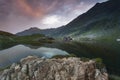 Sunset at Balea Lake. Lodge cabin on beautiful location