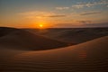 Sunset in the barkhan dessert