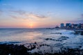 Sunset at Barra Beach with Farol da Barra Barra Lightouse on Background - Salvador, Bahia, Brazil Royalty Free Stock Photo