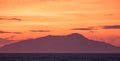 Sunset in the Bay of Naples, Italy. Mount Vesuvius can be seen on the horizon. Photographed near Sorrento . Royalty Free Stock Photo