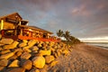 Sunset at a beach bar in Fiji Royalty Free Stock Photo