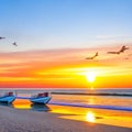 Sunset on the beach with boats in the sea and seagulls flying overhead Royalty Free Stock Photo