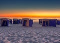 Sunset with beach cabins Royalty Free Stock Photo