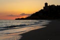 Sunset on the beach and a castle Royalty Free Stock Photo