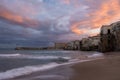 Sunset at the beach of Cefalu Sicily, old town of Cefalu Sicilia panoramic view at the colorful village Royalty Free Stock Photo