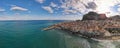 Sunset at the beach of Cefalu Sicily, old town of Cefalu Sicilia panoramic view at the colorful village Royalty Free Stock Photo