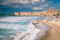 Sunset at the beach of Cefalu Sicily, old town of Cefalu Sicilia panoramic view at the colorful village Royalty Free Stock Photo