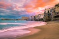 sunset at the beach of Cefalu Sicily, old town of Cefalu Sicilia panoramic view at the colorful village Royalty Free Stock Photo