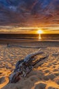 Sunset on the beach with a cloudy sky