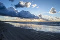 Sunset on the beach with cloudy sky, Baltic sea, Jurmala, Latvia Royalty Free Stock Photo