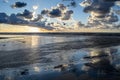 Sunset on the beach with cloudy sky, Baltic sea, Jurmala, Latvia Royalty Free Stock Photo