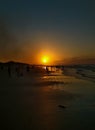 The sunset on the beach creates a beautiful silhouette on the Lombang beach in Sumenep