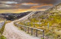 Sunset beach entrance Hollands Duin seen from the crossingZeeweg Royalty Free Stock Photo