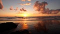 Sunset on the beach. Family plays in the water at sunset.