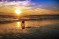 Sunset on the beach handicapped wheelchair