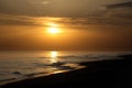 Sunset on the beach of mediterrenean sea Royalty Free Stock Photo