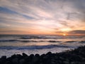 Sunset on beach nature cloudly with stones