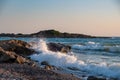 Sunset beach ocean wave splash. stone coast Royalty Free Stock Photo