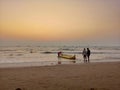 Sunset on a beach, with orange sky