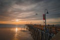 Sunset on the beach and pier. An iconic California wooden pier at 1, 370 feet long in the heart of Pismo Beach city in Central Cal Royalty Free Stock Photo