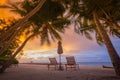 Sunset beach resort. Relaxing and romantic sunset beach scene for background and summer vacation and holiday concept Royalty Free Stock Photo