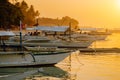 Sunset on the beach with silhouette of banca boat at Panglao Island, Bohol, Philippines Royalty Free Stock Photo