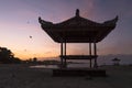 Sunset on the beach, silhouette hut