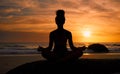 Sunset, beach and silhouette of a woman in a lotus pose while doing a yoga exercise by the sea. Peace, zen and shadow of Royalty Free Stock Photo