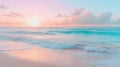 Sunset at the beach, with soft pink and blue colors in the sky and gentle waves lapping at the sandy shore Royalty Free Stock Photo