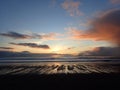 Sunset on a Beach with tide