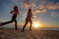 Sunset beach two fit girls jogginr on sand