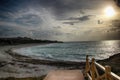 Sunset on the beach Varadero in Cuba. There is gold sun and clear water of atlantic ocean. There is long sandy beach Royalty Free Stock Photo