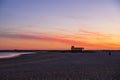 Sunset beach view of the historical life-guard building in Fuseta, Ria Formosa Natural park, Portugal Royalty Free Stock Photo