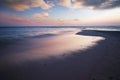 Sunset on the beach with view to the ocean and sky