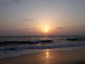 sunset on the beach, wave on the beach, beautiful sunset view in the Indian Ocean, sunset view in the goa, Royalty Free Stock Photo
