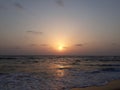 sunset on the beach, wave on the beach, beautiful sunset view in the Indian Ocean, sunset view in the goa, Royalty Free Stock Photo