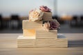 Sunset beach wedding featuring a beautifully adorned cake as the centerpiece