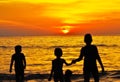 Sunset beach with young children Royalty Free Stock Photo