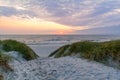 Sunset at beautiful beach with sand dune landscape near Henne Strand, Jutland Denmark Royalty Free Stock Photo