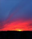 Sunset with beautiful colors of sky and clouds, sunrays