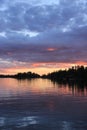 Sunset over the water, Lake of the Woods, Kenora, Ontario Royalty Free Stock Photo