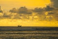 Sunset with beautiful Landscape views of traditional wooden fishing boats known as moon boats on the beach near Cox's Bazar in Royalty Free Stock Photo