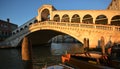 Sunset on the beautiful Rialto Bridge, crowded with people as always Royalty Free Stock Photo