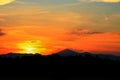 Sunset beautiful and silhouette mountain tree woodland colorful landscape in sky twilight time Royalty Free Stock Photo