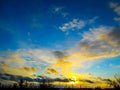 Sunset. Beautiful sky. Beautiful blue sky, sun and clouds Royalty Free Stock Photo