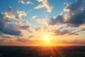 Sunset with beautiful small cumulus clouds in contrasting sun rays, scattered across the blue sky Royalty Free Stock Photo